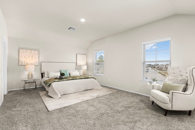 bedroom with carpet and vaulted ceiling