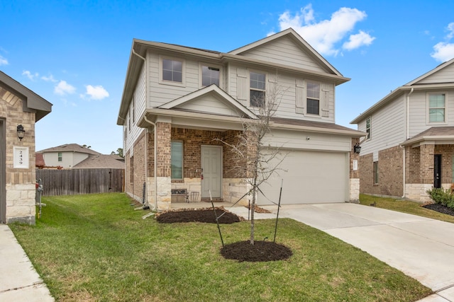 view of front of house featuring a front yard and a garage