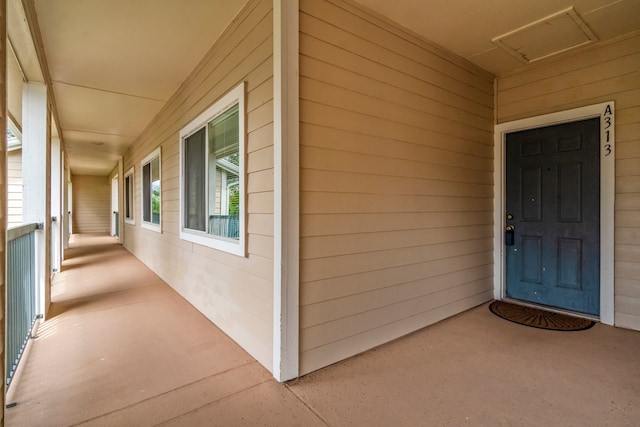 property entrance with a porch