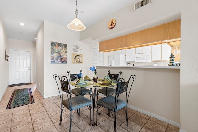 view of tiled dining room