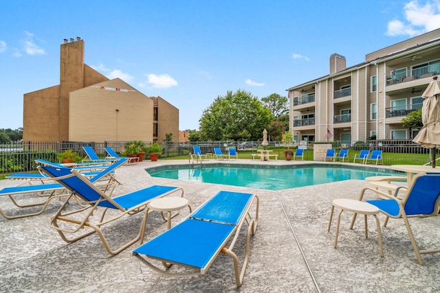 12800 Melville Dr Unit A313, Montgomery, TX 77356 - pool featuring a patio and fence