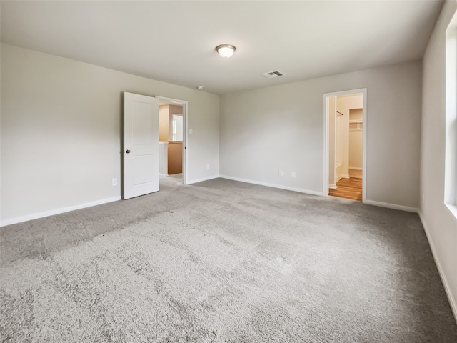 empty room featuring carpet floors