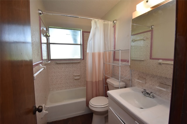 full bathroom with backsplash, vanity, shower / tub combo, and toilet