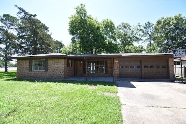 single story home featuring a garage and a front yard