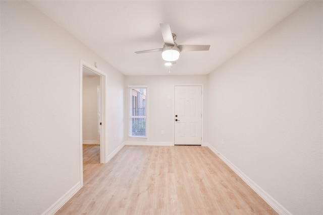 foyer featuring ceiling fan and light wood-type flooring