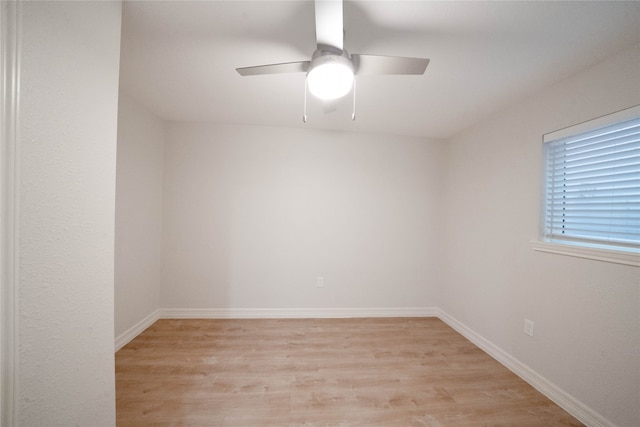 unfurnished room featuring light wood-type flooring and ceiling fan