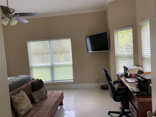 home office featuring ceiling fan, light tile patterned floors, and crown molding