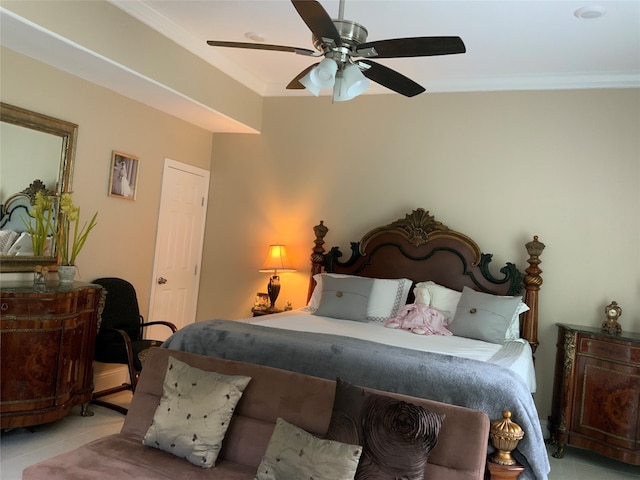 bedroom with ceiling fan and ornamental molding