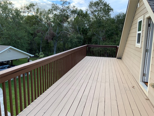 deck featuring a yard