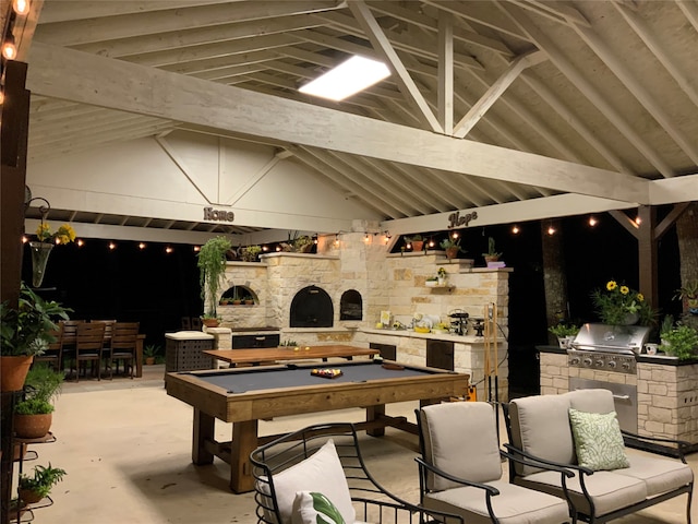 view of patio / terrace featuring grilling area and an outdoor kitchen