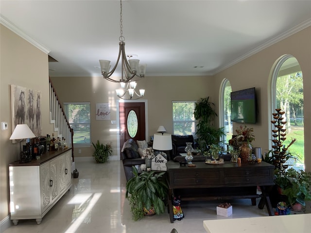 living room with ornamental molding and a notable chandelier