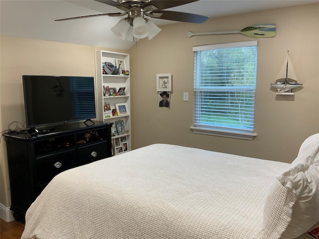 bedroom with ceiling fan and hardwood / wood-style floors