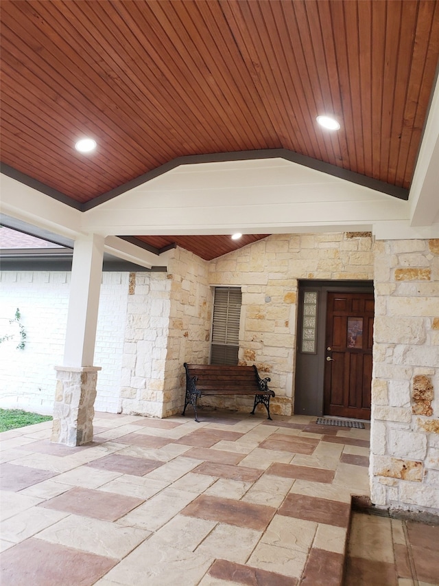 entrance to property featuring a patio