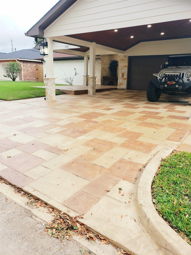 view of patio / terrace with a carport