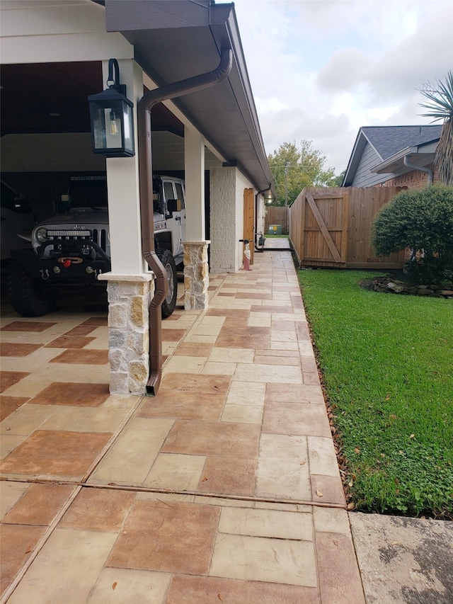 exterior space featuring a yard and a patio