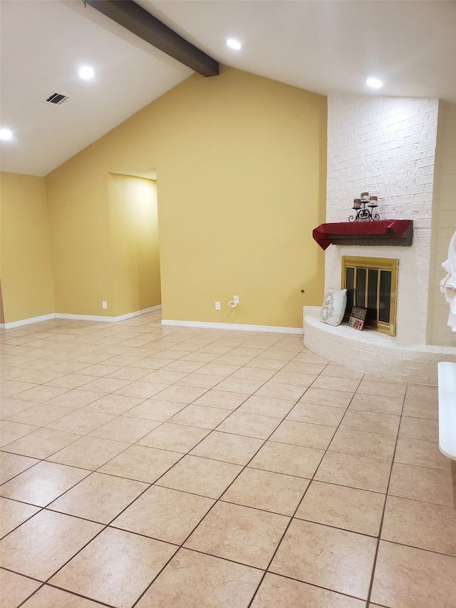 unfurnished living room featuring a brick fireplace, vaulted ceiling with beams, and light tile patterned flooring