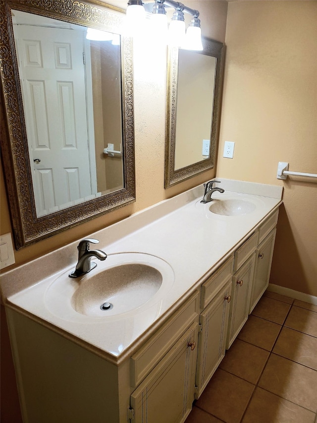 bathroom featuring vanity and tile patterned flooring