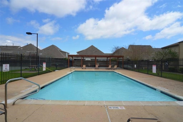 view of pool with a patio area and a gazebo