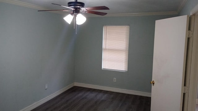 empty room featuring crown molding, ceiling fan, and dark wood-type flooring