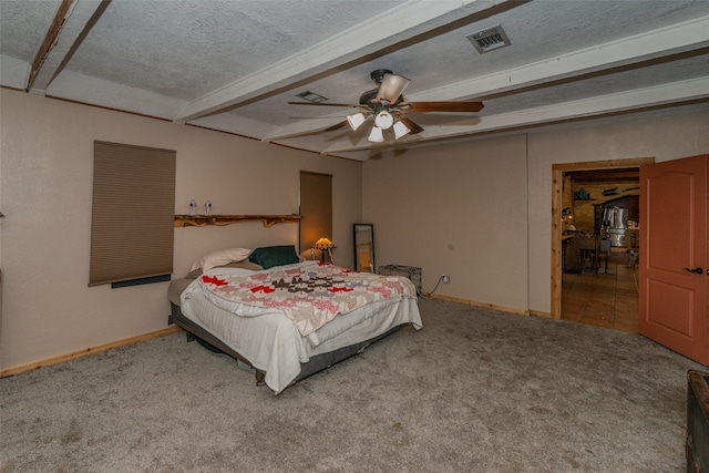 bedroom featuring ceiling fan, carpet floors, beamed ceiling, and a textured ceiling