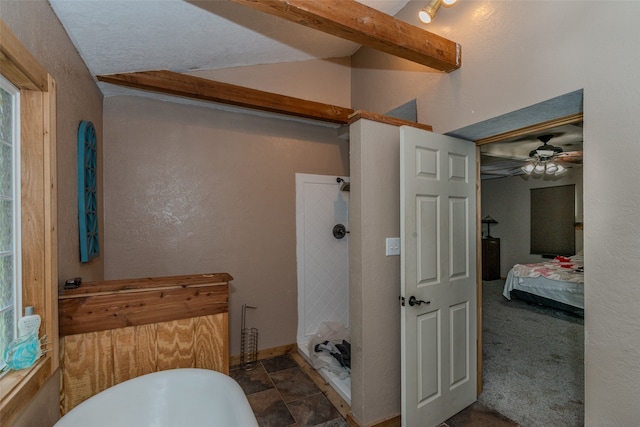 bathroom with a textured ceiling, independent shower and bath, and ceiling fan