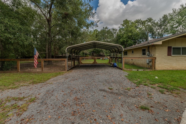 exterior space with a carport