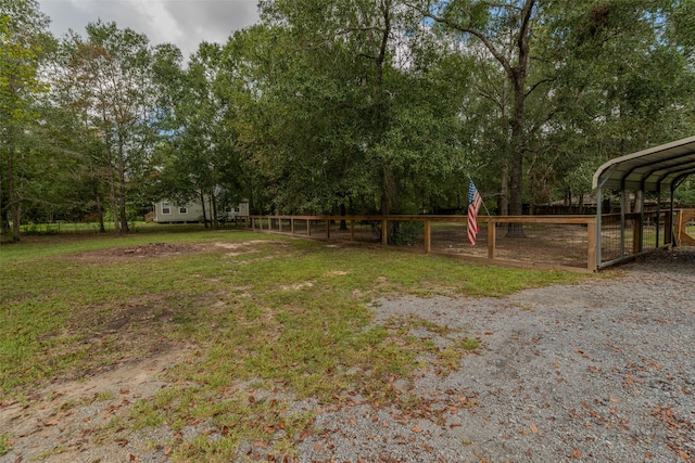 view of yard featuring a carport