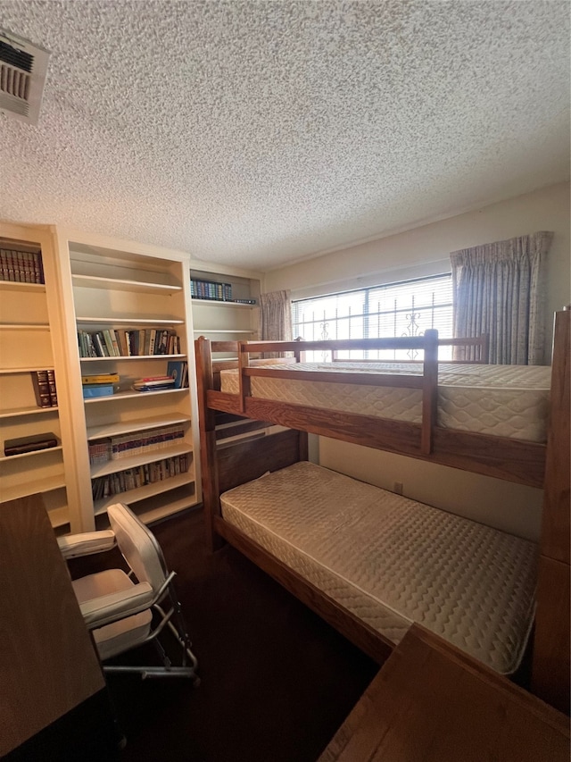 bedroom with a textured ceiling