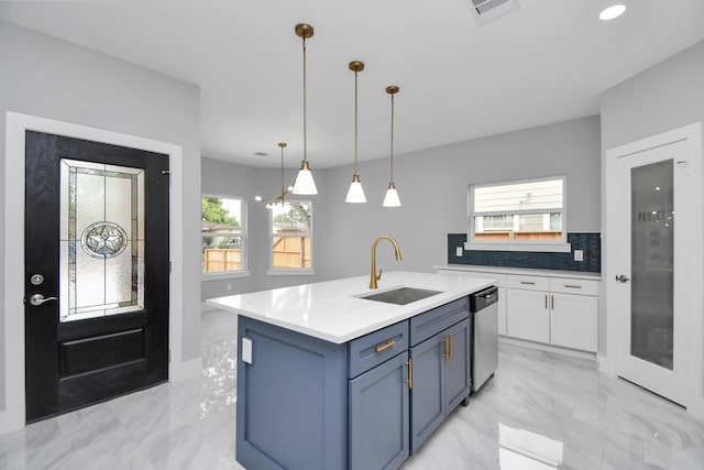 kitchen featuring plenty of natural light, dishwasher, sink, and an island with sink