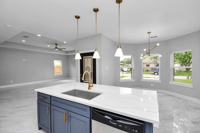 kitchen with ceiling fan with notable chandelier, decorative light fixtures, dishwasher, light stone counters, and sink