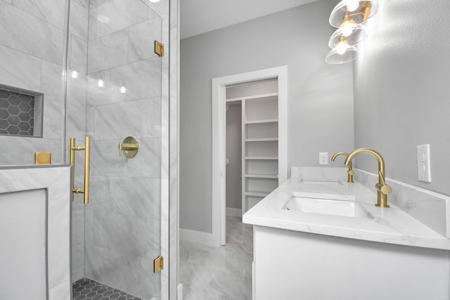 bathroom featuring vanity and walk in shower