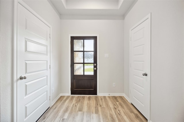 doorway to outside featuring light wood-type flooring