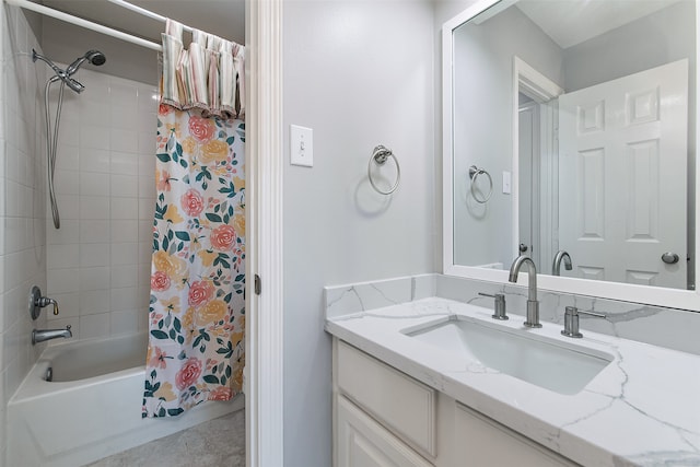 bathroom with vanity and shower / tub combo with curtain