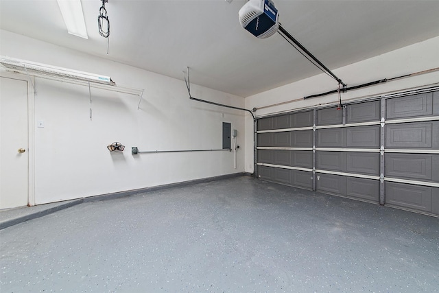 garage featuring a garage door opener and electric panel