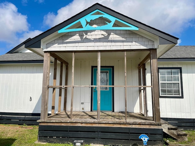 doorway to property featuring a porch