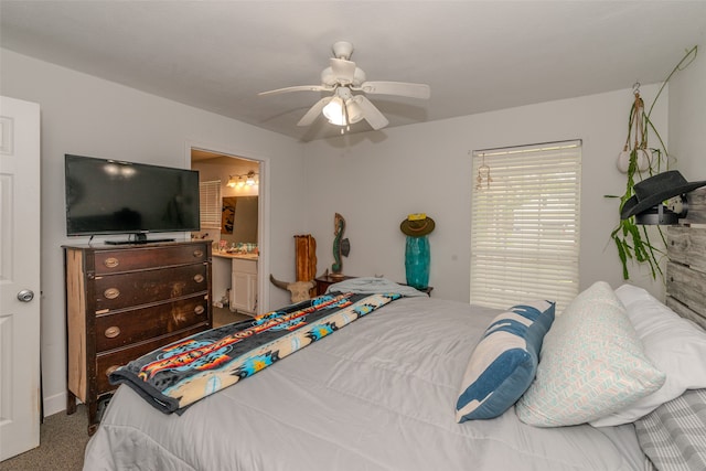 bedroom featuring ensuite bath, ceiling fan, and carpet