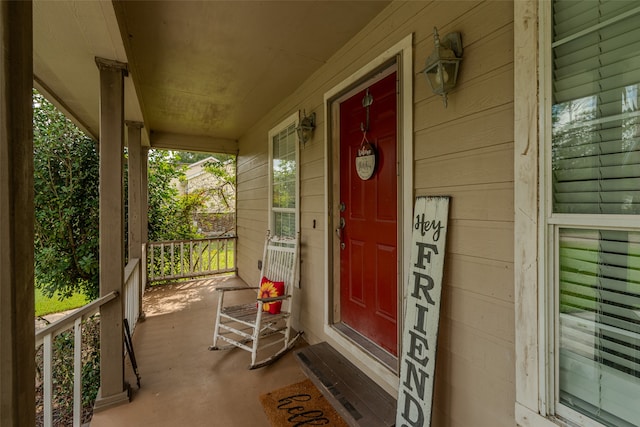 doorway to property featuring a porch