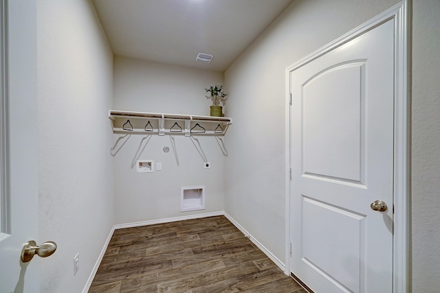 laundry area with dark wood-type flooring, electric dryer hookup, and washer hookup