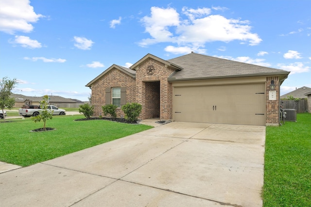 ranch-style house featuring central AC, a garage, and a front lawn