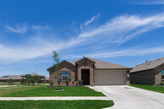 ranch-style home featuring a garage and a front lawn