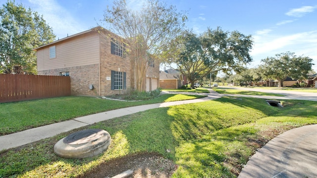 view of home's exterior featuring a lawn