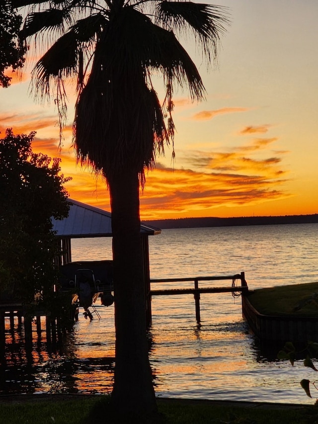 dock area featuring a water view