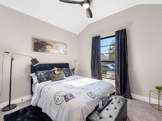 carpeted bedroom featuring ceiling fan and lofted ceiling