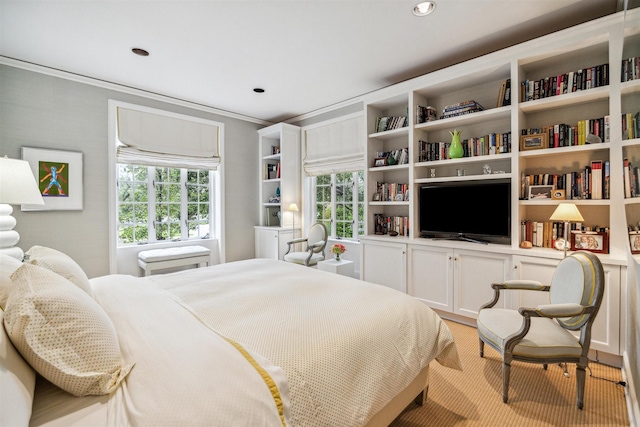 bedroom with crown molding