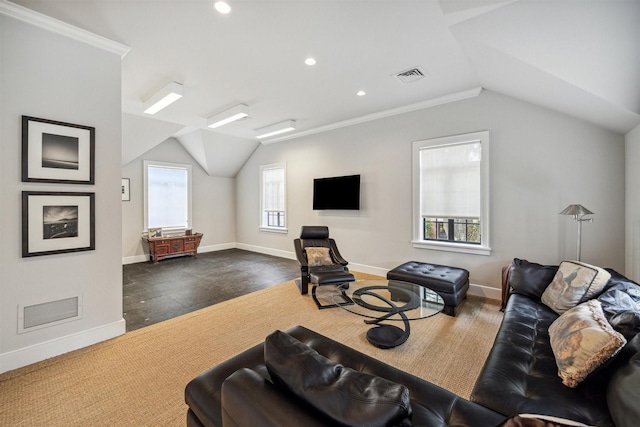 living room featuring ornamental molding, a wealth of natural light, and vaulted ceiling