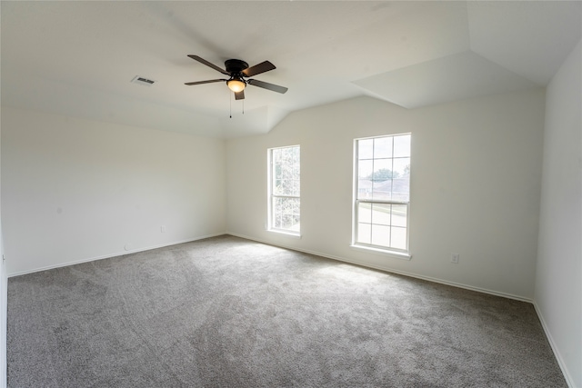 unfurnished room with ceiling fan and carpet flooring