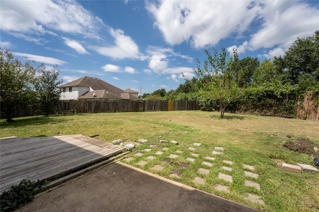 view of yard with a deck