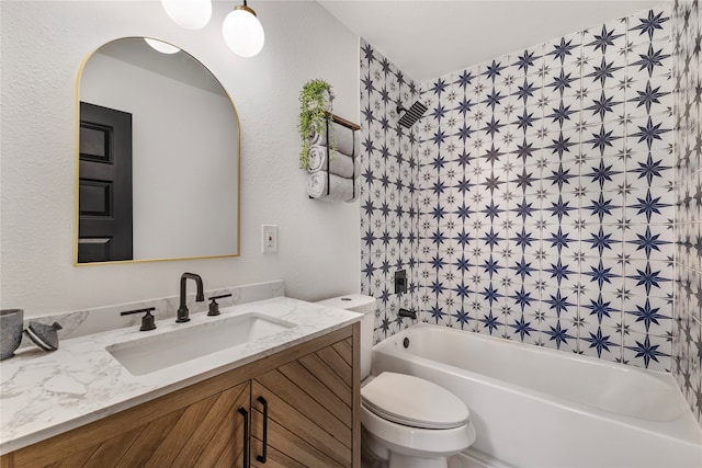 full bathroom featuring shower / tub combination, toilet, and vanity