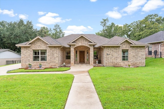 view of front of house with a front lawn