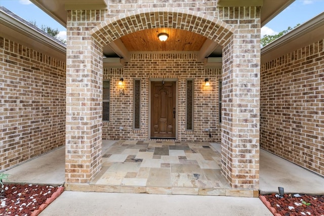 doorway to property featuring a patio